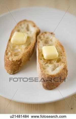 Picture - French bread and butter. Fotosearch