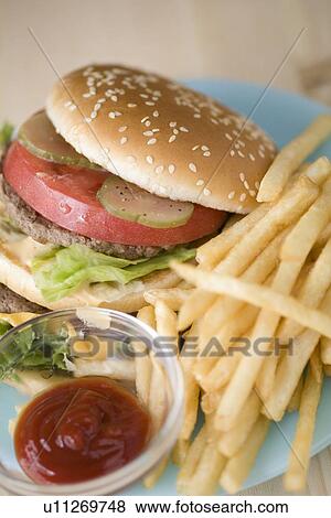 Stock Photo - Hamburger and french fries. Fotosearch