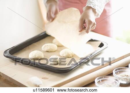 Human hand of young woman baking bread View Large Photo Image Stock Image - Human hand of young woman baking bread. Fotosearch