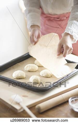Human hand of young woman baking bread View Large Photo Image Stock Image - Human hand of young woman baking bread. Fotosearch