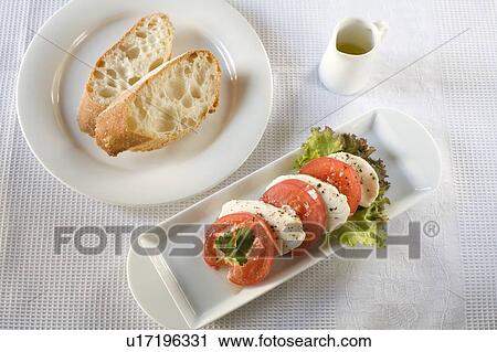 Insalata di caprese and bread View Large Photo Image Stock Image - Insalata di caprese and bread. Fotosearch