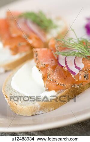Smoked salmon and cream cheese open sandwiches View Large Photo Image Picture - Smoked salmon and cream cheese open sandwiches. Fotosearch