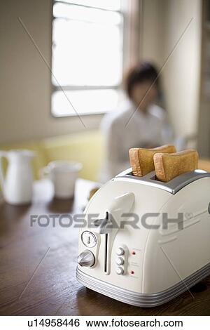 Toast in toaster View Large Photo Image Stock Photograph - Toast in toaster. Fotosearch
