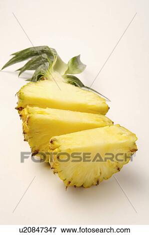 Stock Photo - Pineapple in slices,. Fotosearch