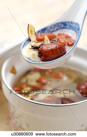 Stock Photo - Date, Wolfberry, Angelica, Szechwan Lovage Rhizome, White Paeony Root,. Fotosearch