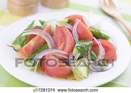 Tomato and Cucumber Salad View Large Photo Image Picture - Tomato and Cucumber Salad. Fotosearch