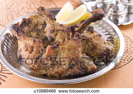 Stock Photograph - Garlic Chicken. Fotosearch