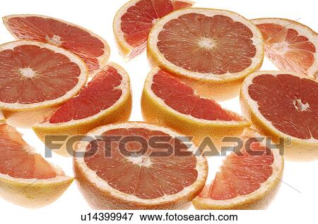 Stock Photo - Grapefruits, slices and pieces. Fotosearch