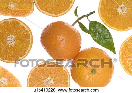 Stock Photo - Oranges, fruits and slices. Fotosearch