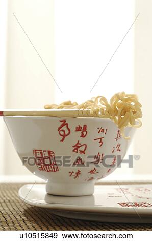 Asian bowl, chopsticks and noodles View Large Photo Image Stock Photo - Asian bowl, chopsticks and noodles. Fotosearch