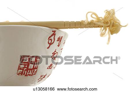 Asian bowl with noodles and chopsticks View Large Photo Image Stock Photograph - Asian bowl with noodles and chopsticks. Fotosearch