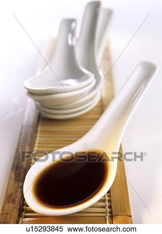 Stock Photography - Asian spoon with soy sauce. Fotosearch
