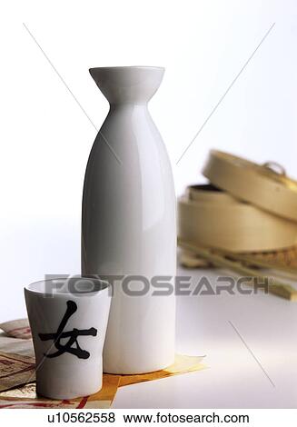 Stock Photo - Japanese sake carafe with a sake cup. Fotosearch
