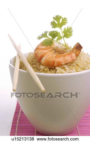Stock Photo - Rice with shrimps and parsley. Fotosearch
