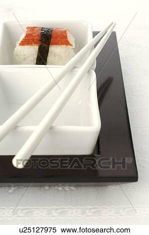Small Asian bowls with sushi and chopsticks View Large Photo Image Stock Photography - Small Asian bowls with sushi and chopsticks. Fotosearch