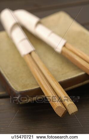 Stock Image - Two pairs of chopsticks. Fotosearch
