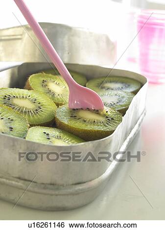 Sliced kiwis in a lunchbox View Large Photo Image Stock Photograph - Sliced kiwis in a lunchbox. Fotosearch