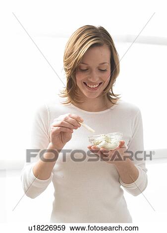 Woman dipping cabbage turnip View Large Photo Image Stock Photo - Woman dipping cabbage turnip. Fotosearch