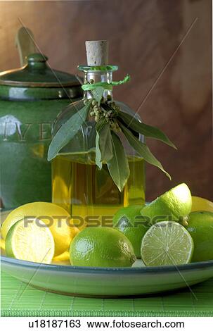 Olive oil and limes View Large Photo Image Stock Image - Olive oil and limes. Fotosearch