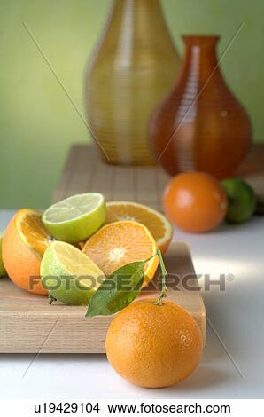 Picture - Oranges and limes. Fotosearch
