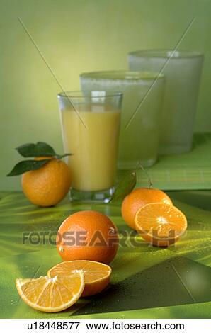 Oranges and orange juice View Large Photo Image Stock Photo - Oranges and orange juice. Fotosearch