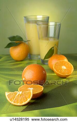 Stock Photography - Oranges and orange juice. Fotosearch