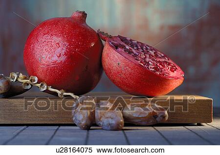 Pomegranate, and date View Large Photo Image Stock Photography - Pomegranate, and date. Fotosearch