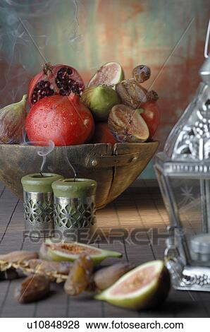 Stock Photo - Pomegranate, date and fig. Fotosearch