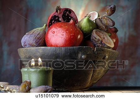 Pomegranate, date and fig View Large Photo Image Stock Photo - Pomegranate, date and fig. Fotosearch