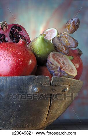 Stock Photo - Pomegranate, date and fig. Fotosearch