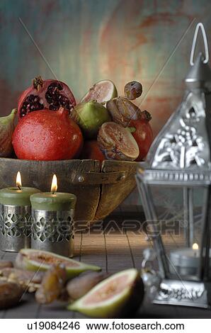 Stock Photograph - Pomegranate, date and fig. Fotosearch
