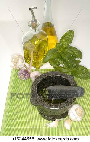 Stock Photo - vinegar and oil, basil and mortar. Fotosearch