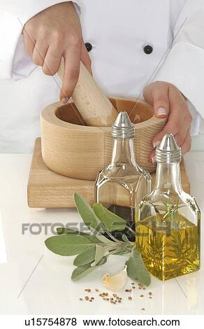 Stock Photo - vinegar, oil and mortar. Fotosearch