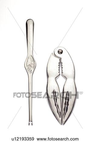 Stock Photo - Lobster cracker and fork. Fotosearch
