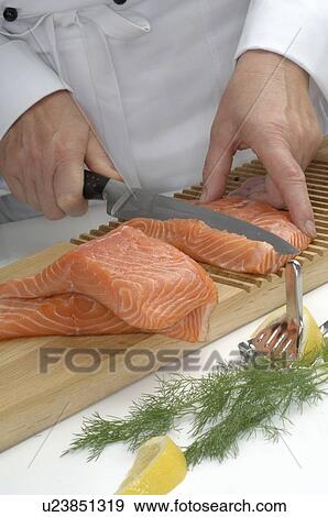 Stock Photo - Preparation of salmon. Fotosearch