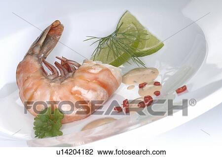 Stock Image - Shrimp with lime. Fotosearch
