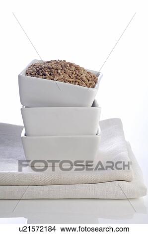 Picture - Bowl filled with grain. Fotosearch