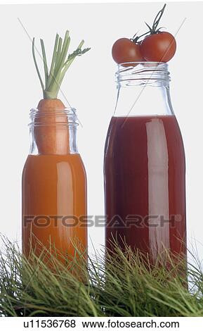 Stock Photo - Carrot juice and tomato juice. Fotosearch
