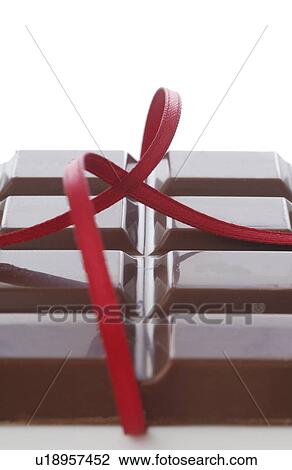 Stock Image - Chocolate bar and ribbon. Fotosearch
