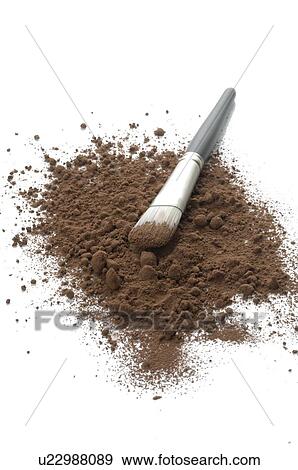 Stock Photo - Chocolate powder and a brush. Fotosearch