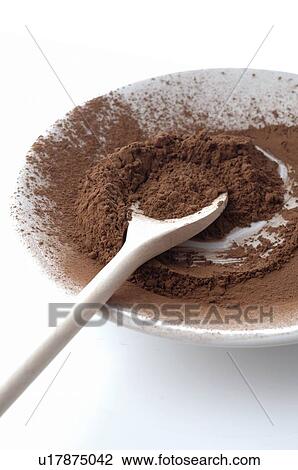 Stock Image - Chocolate powder on a plate. Fotosearch