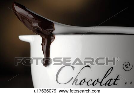 Melted chocolate View Large Photo Image Stock Photo - Melted chocolate. Fotosearch