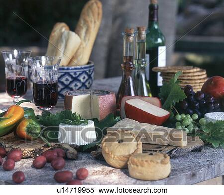 Stock Photography - Büfett mit Käse, Früchten, Kuchen und Wein. Fotosearch