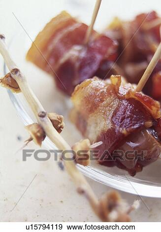 Stock Photo - Datteln mit Speckmantel. Fotosearch
