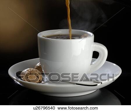 Stock Image - Pouring coffee into a cup. Fotosearch