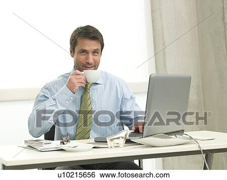 Businessman drinking Coffee View Large Photo Image Stock Photograph - Businessman drinking Coffee. Fotosearch