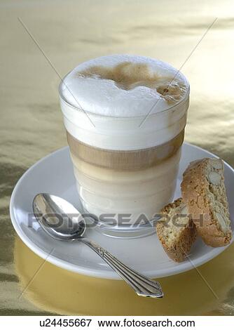 Cappuccino with coffee cakes View Large Photo Image Stock Photo - Cappuccino with coffee cakes. Fotosearch