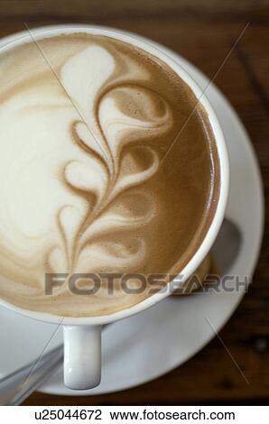 Cappuccino with decorative froth View Large Photo Image Stock Image - Cappuccino with decorative froth. Fotosearch