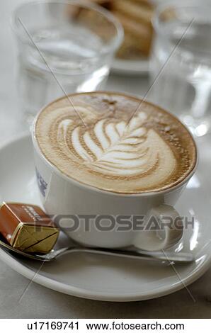 Stock Image - Cappuccino with froth ornament. Fotosearch