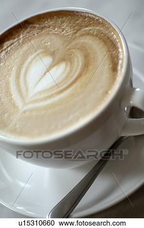 Stock Image - Cappuccino with heart-shaped froth. Fotosearch